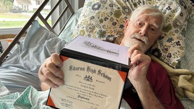 Image for story: 98-year-old Marine veteran in hospice care finally receives his high school diploma