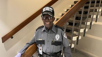 Image for story: 96-year-old war veteran fights cancer while serving as beloved security guard