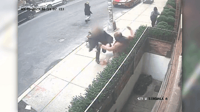 Image for story: Video: Man helps tackle gunman on the run from police