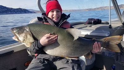 Image for story: Utah boy, 11, catches 48-pound trout six months after nabbing 41 pounder
