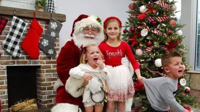 Image for story: PHOTOS | Central Ohio kids not really enjoying being on Santa's lap