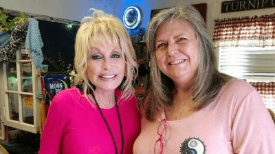 Image for story: 'Oh my God, it really is you!' Dolly Parton makes surprise visit to Middle Tenn. store 