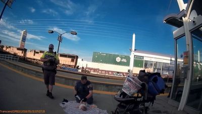 Image for story: VIDEO: Police officer changes baby's diaper after responding to call