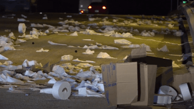 Image for story: Big rig hauling trailer full of toilet paper bound for San Antonio crashes, catches fire