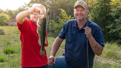 Image for story: Blake Shelton takes foster children fishing on his farm