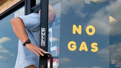 Image for story: Gas prices surge higher as drivers rush to fill their tanks