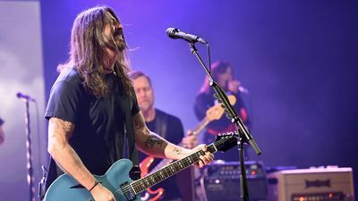 Image for story: Dave Grohl trolls Westboro Baptist Church outside Foo Fighters concert by playing disco