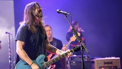 Image for story: Dave Grohl trolls Westboro Baptist Church outside Foo Fighters concert by playing disco