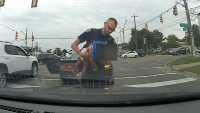 Image for story: VIDEO: 18-month-old child struggling to breathe saved by officer during traffic stop