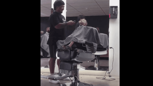 Young boy falls asleep in barber chair while getting haircut (Courtesy: Rangi Thompson)