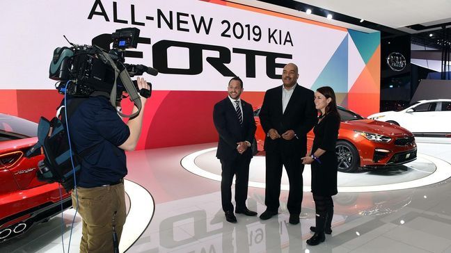 Mike Woolfolk and Jill Ciminillo with 2018 NAIAS Chairman Ryan LaFontaine of LaFontaine Automotive Group.{&nbsp;}{&nbsp;} (Photo: Mike Woolfolk){p}{/p}