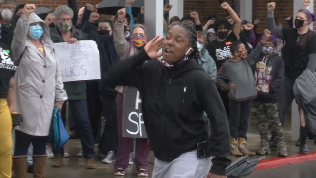 Constance Every leads a chant outside Freedom Hall in support of the ETSU men's basketball team (WCYB Photo).