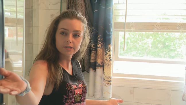 Stephanie Merola, of Cranston, R.I. tells WJAR she was getting ready to shower when she heard a buzzing sound coming from outside of her home. That sound turned out to be a drone. (WJAR)