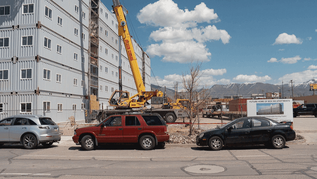 Friday, the final piece was put into place on a six-story apartment complex in Salt Lake City built solely out of shipping containers. (Photo: Mark Less, KUTV)