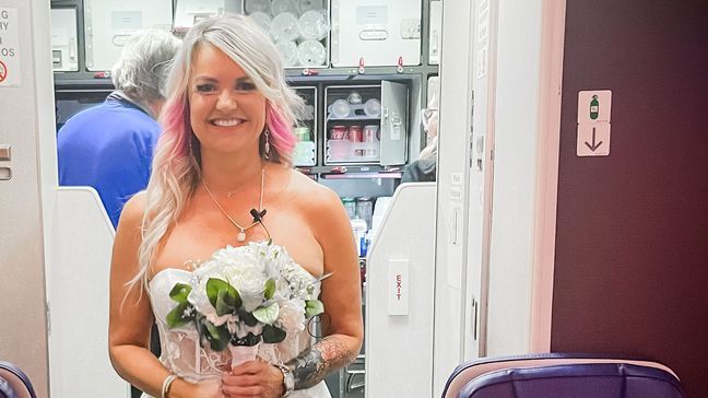 Pam Patterson smiles as she prepares to walk down the aisle. (Photo: Kaitlyn Manzer)