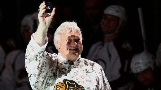 FILE - Former Chicago Blackhawks star Bobby Hull waves to fans before the NHL hockey game between the Blackhawks and the Colorado Avalanche in Chicago, Nov. 11, 2009. Hull, a Hall of Fame forward who helped the Blackhawks win the 1961 Stanley Cup Final, has died. He was 84. The Blackhawks and the NHL Alumni Association announced the death of the two-time NHL MVP on Monday, Jan. 30, 2023. (AP Photo/Nam Y. Huh, file)