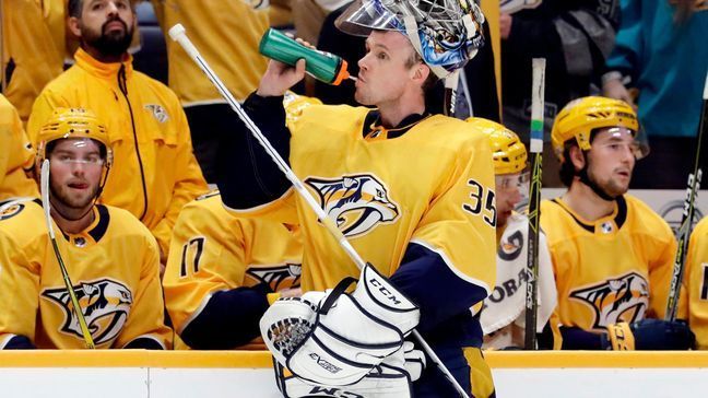 In this Feb. 25, 2018, photo, Nashville Predators goalie Pekka Rinne (35), of Finland, takes a break in the third period of an NHL hockey game against the St. Louis Blues in Nashville, Tenn. Rinne was a key factor in falling short in the Stanley Cup Final last season when he got chased twice in Pittsburgh. He's bounced back with a Vezina-worthy season with some unfinished business. The Predators are scheduled to face the Colorado Avalanche in the first round of the NHL Stanley Cup playoffs Thursday (AP Photo/Mark Humphrey)