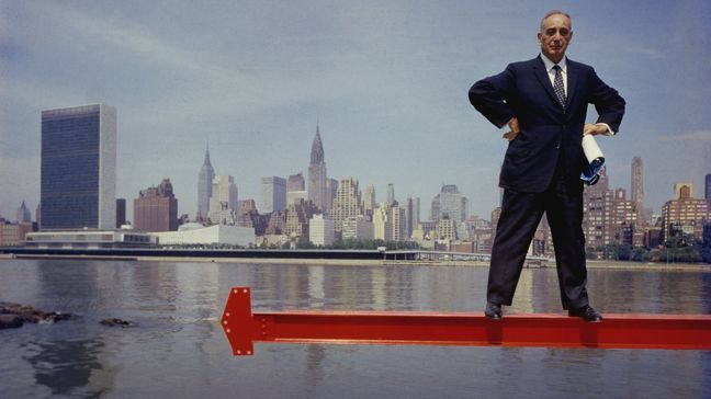 Master city planner Robert Moses stands on beam over the East River on Roosevelt Island June 4, 1959 in New York City. (Photo by Arnold Newman Properties/Getty Images)