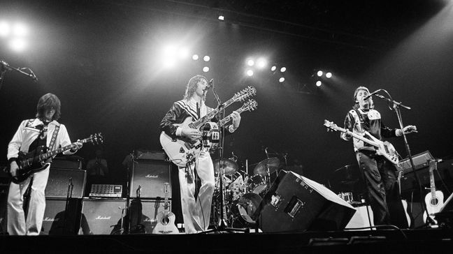 FILE - Paul McCartney and Wings perform before a sold-out audience of 14,000 at Tarrant County Convention Center in Fort Worth, Texas, May 4, 1976. Denny Laine, center, a British singer, songwriter and guitarist who performed in an early, pop-oriented version of the Moody Blues and was later McCartneyâs longtime sideman in the ex-Beatleâs solo band Wings, died Tuesday, Dec. 5, 2023, his wife said in a social media post. (AP Photo/File)