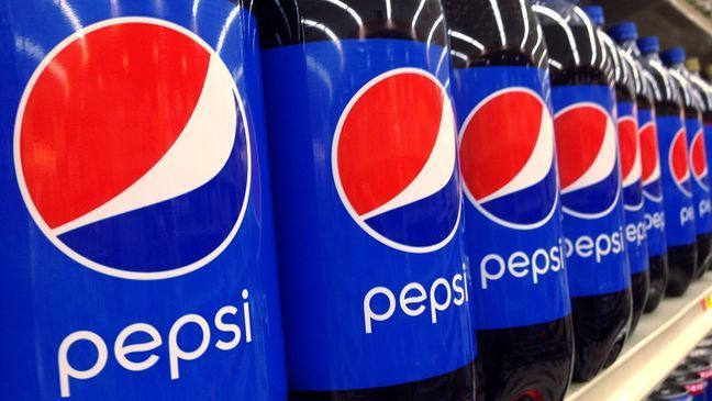 FILE - In this July 9, 2015, file photo, Pepsi bottles are on display at a supermarket in Haverhill, Mass. PepsiCo reports financial results Tuesday, Feb. 13, 2018. (AP Photo/Elise Amendola, File)