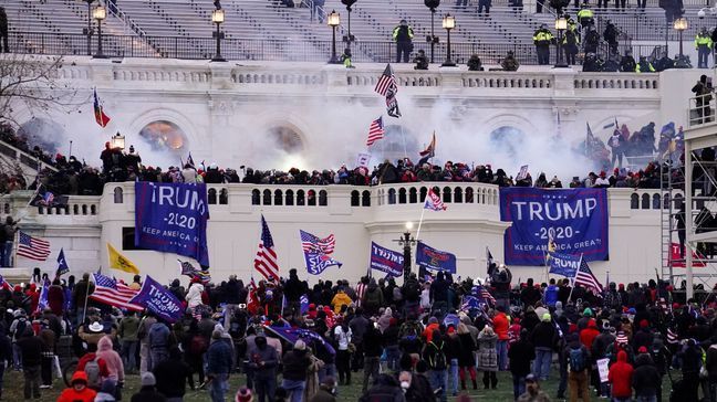 FILE - Violent insurrectionists loyal to President Donald Trump, storm the Capitol, Wednesday, Jan. 6, 2021, in Washington. (AP Photo/John Minchillo, File)