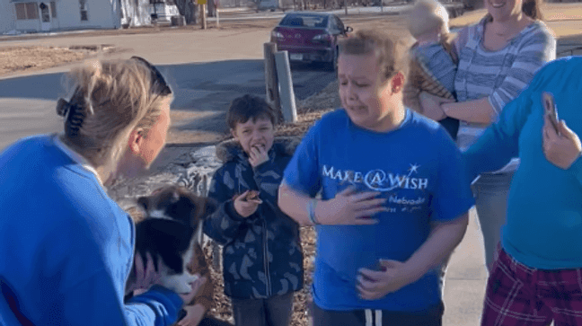 Make-A-Wish Nebraska gives an 11-year-old boy a puppy on Feb. 20, 2023. (Make-A-Wish Nebraska)