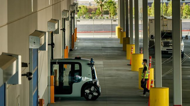 A robotaxi from Zoox drives down a street in Las Vegas in this provided photo. (Courtesy Zoox)