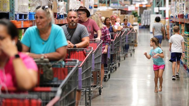 Costco is lifting some restrictions that were put in place because of the coronavirus.  (Joe Burbank/Orlando Sentinel via AP)