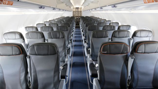 FILE - This Thursday, March 16, 2017, file photo shows the interior of a commercial airliner at John F. Kennedy International Airport in New York. (AP Photo/Seth Wenig, File)