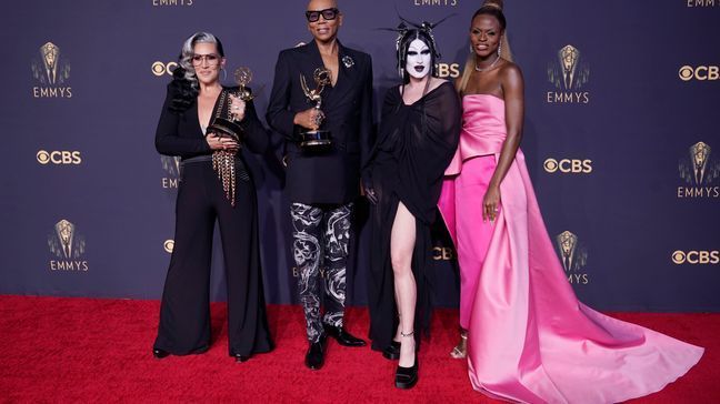 Michelle Visage, from left, RuPaul Charles, Gottmik, and Symone pose for a photo with the award for outstanding competition program for "RuPaul's Drag Race" at the 73rd Primetime Emmy Awards on Sunday, Sept. 19, 2021, at L.A. Live in Los Angeles. (AP Photo/Chris Pizzello)