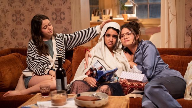 Amanda (Molly Gordon) and Nadine (Phillipa Soo) try to help Lucy (Geraldine Viswanathan, center) feel better in TriStar Pictures' THE BROKEN HEARTS GALLERY.{&nbsp;} (Photo: Sony)