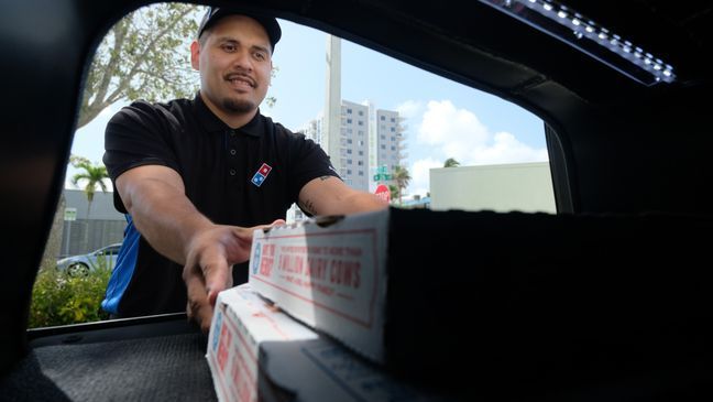 Ford Motor Co. partners with companies like Domino's to test its self-driving service in Miami, Fla. (Image courtesy of Ford Motor Co.)