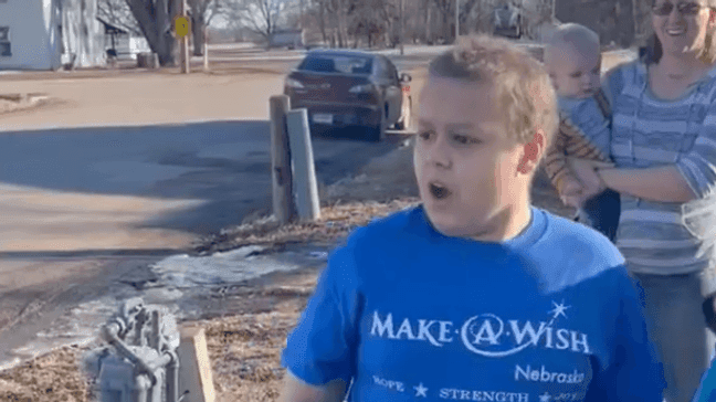 Make-A-Wish Nebraska gives an 11-year-old boy a puppy on Feb. 20, 2023. (Make-A-Wish Nebraska)