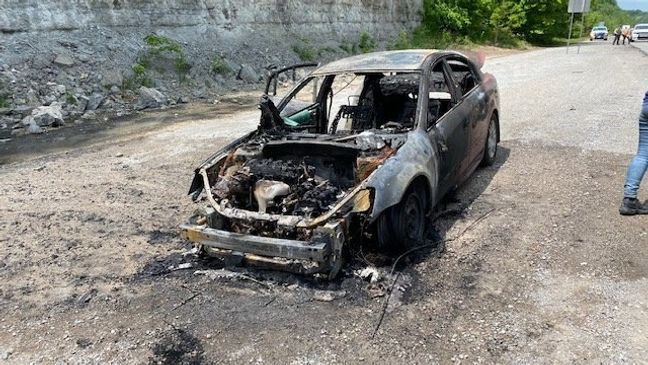 The newly engaged couple's car was fully engulfed in flames. (Photo: Williamson Fire-Rescue)