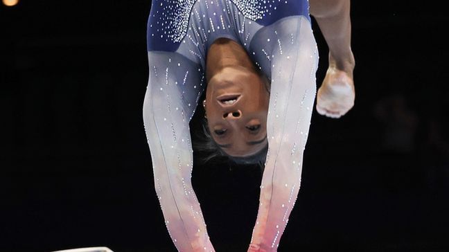 United States' Simone Biles competes on the beam during the women's team final at the Artistic Gymnastics World Championships in Antwerp, Belgium, Wednesday, Oct. 4, 2023. (AP Photo/Geert vanden Wijngaert)