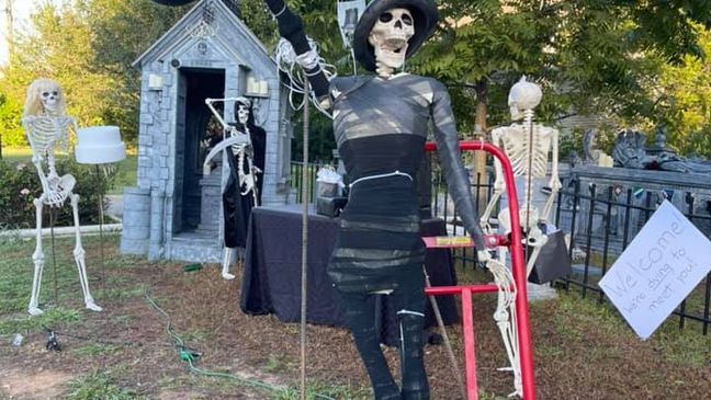 Tennessee family and friends work together to change out elaborate skeleton family yard display in Clarksville each day of October (PHOTOS: The Bones Family/Sarah Garcia){p}{/p}