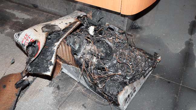 A suspected arsonist was arrested for allegedly setting a fire at a Bellevue dentist office and burning boxes with protective masks and gear inside. (Photo: Bellevue Police Department)