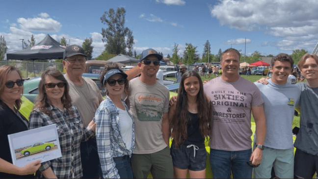 Joyce Lyn and her family stand in front of the car they worked six months to restore. (Photo: KRCR)